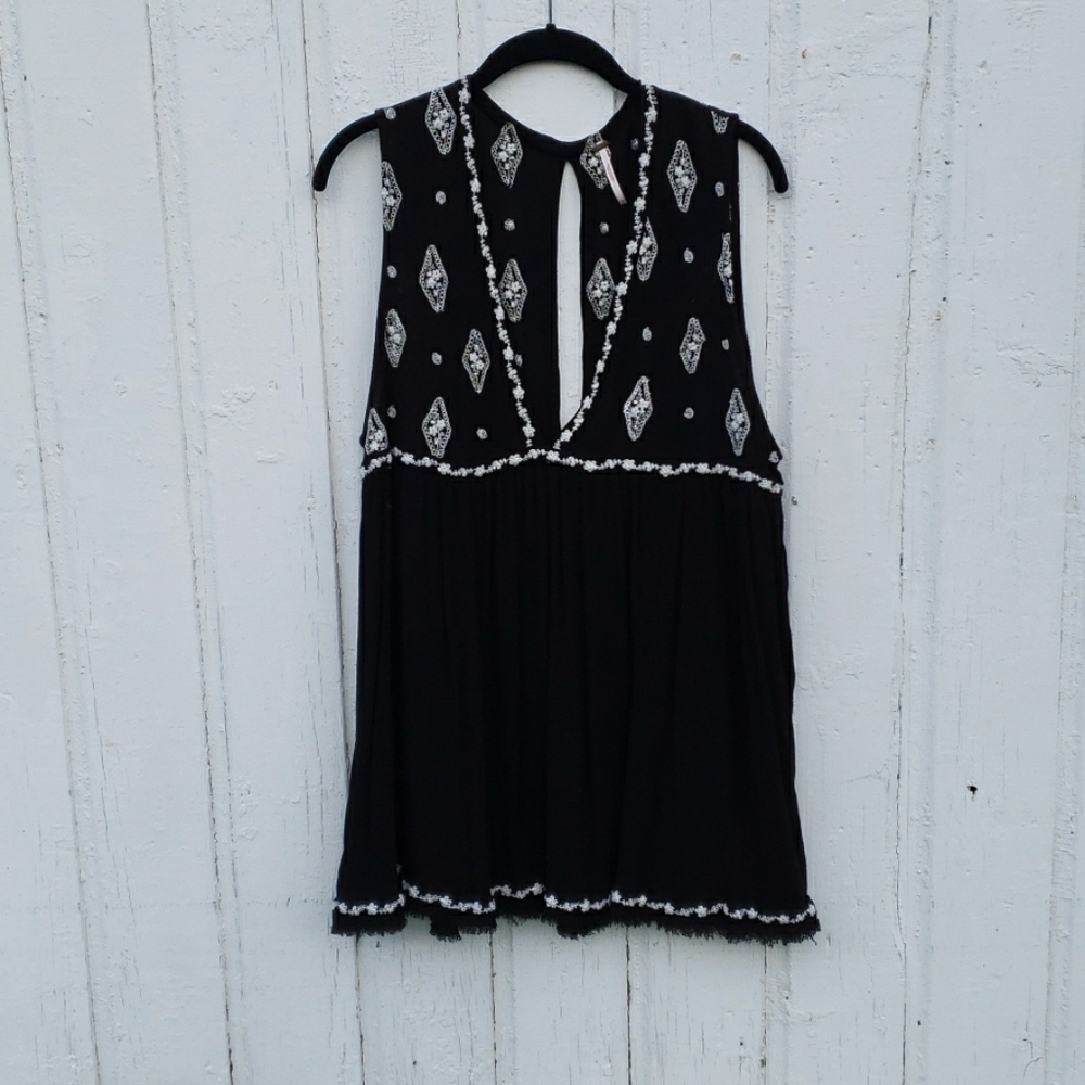 Free People low cut flowing tank -Never worn